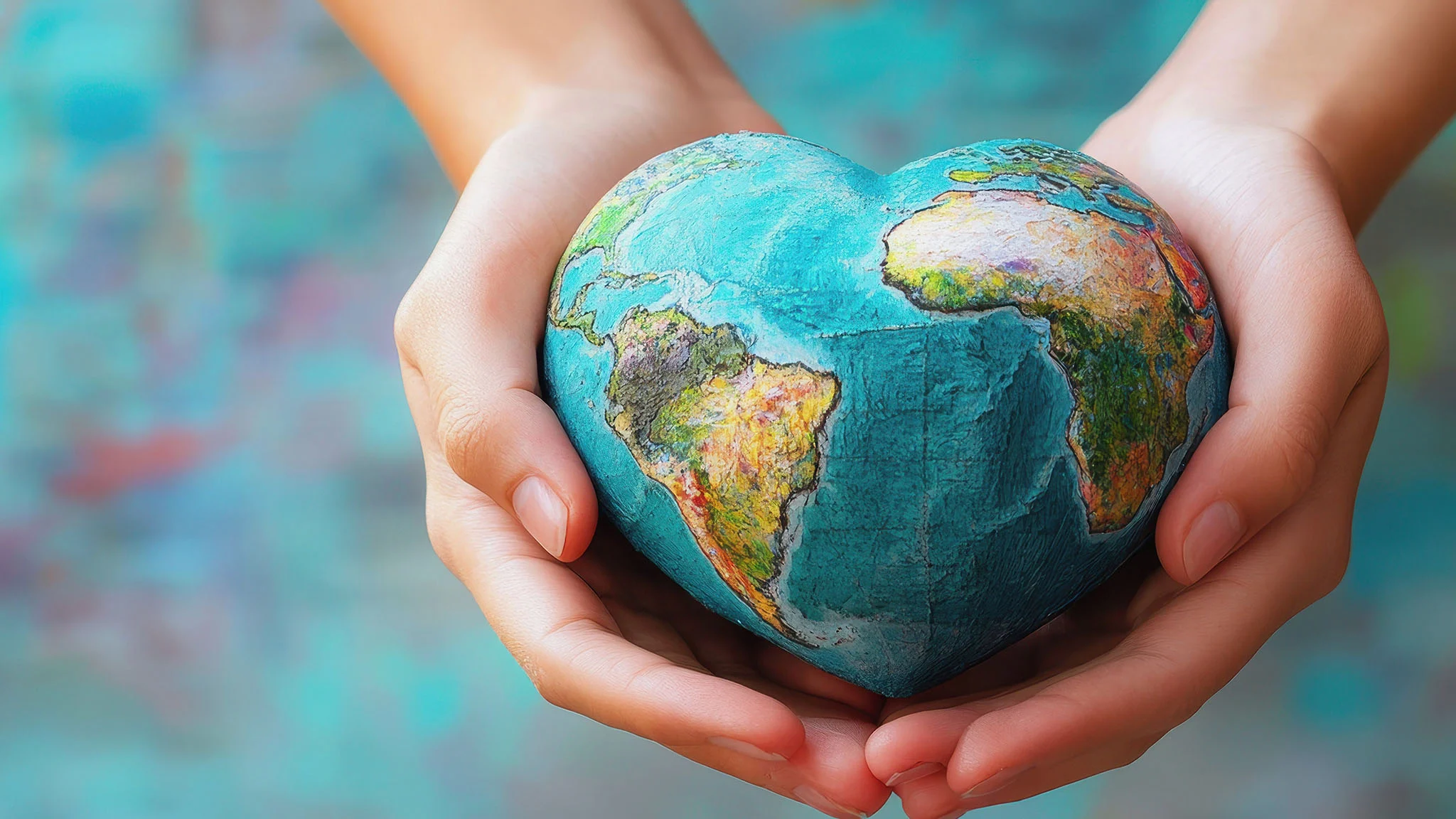 heartshaped-globe-in-hands.webp